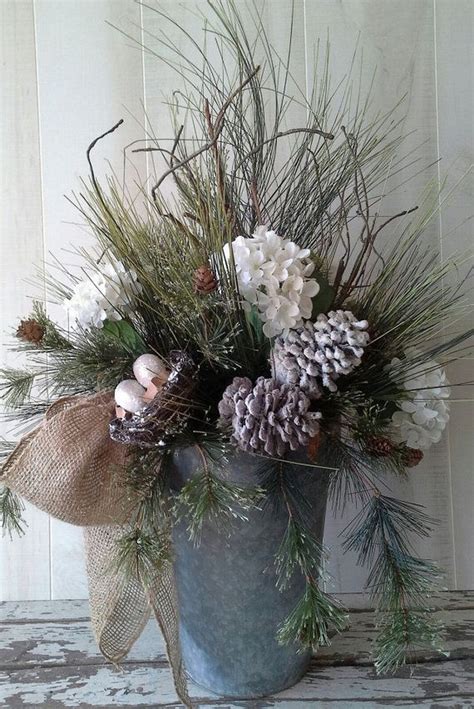 Winter Magic: Transform your home with a stunning winter arrangement.